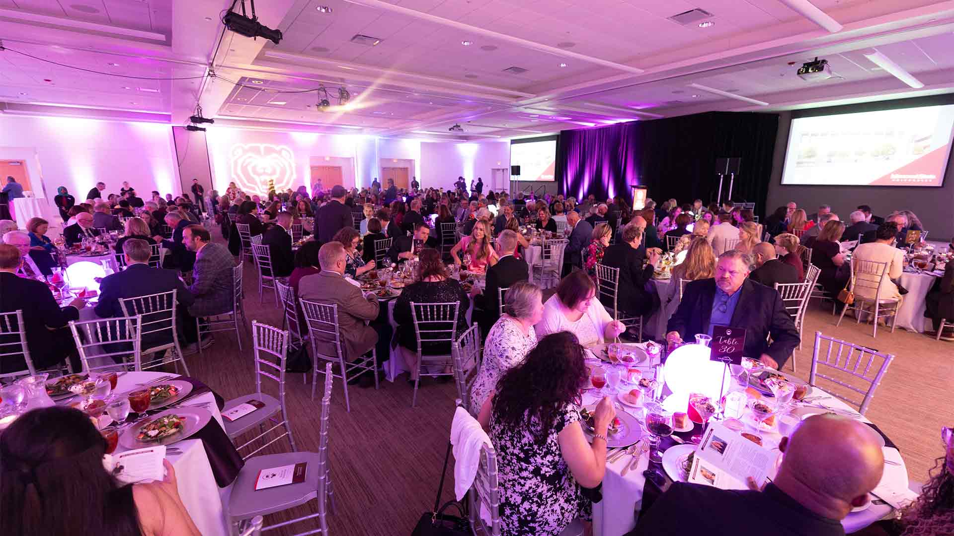 Attendees seated at tables during the Bears of Distinction dinner.