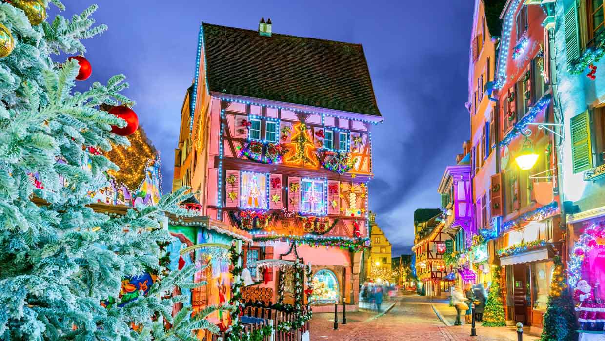 Holiday lights decorate buildings and homes in a German village.