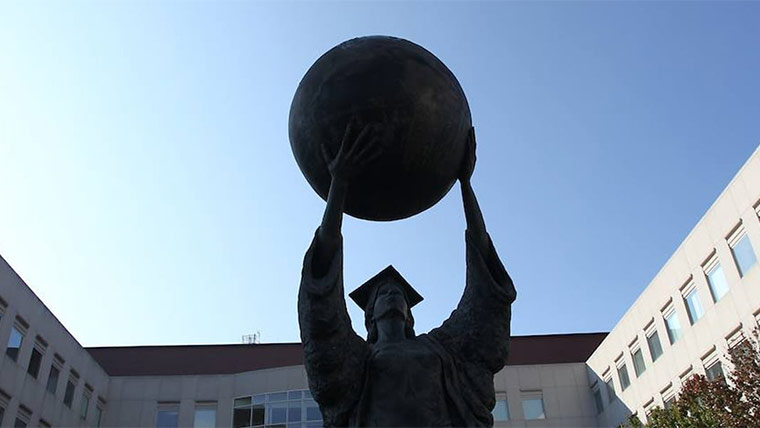 The public affairs statue in front of Strong Hall.